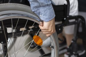 close up hand holding wheel 1